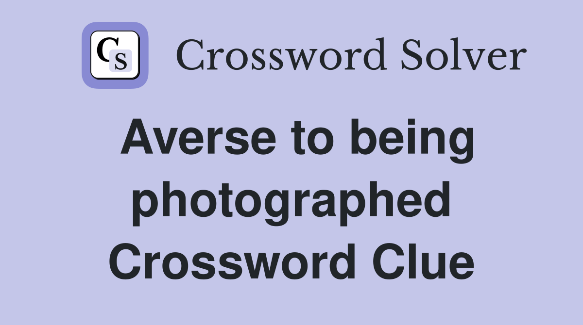 Averse to being photographed Crossword Clue