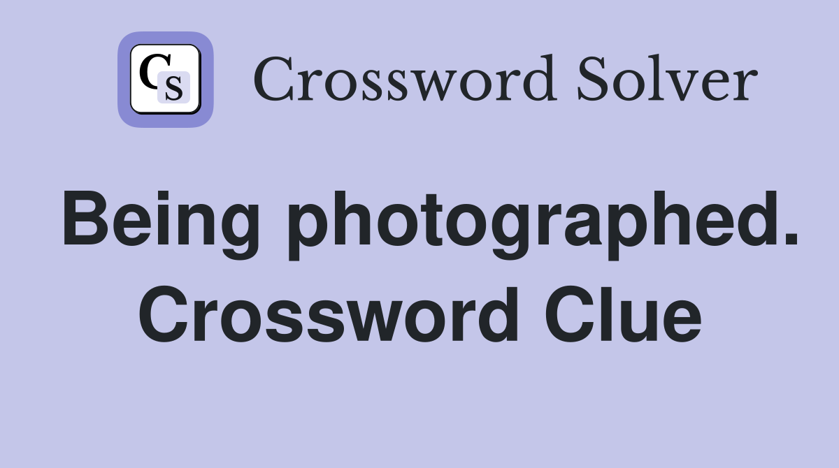 Being photographed. Crossword Clue