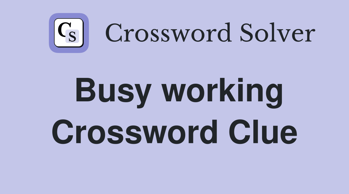 Busy working Crossword Clue