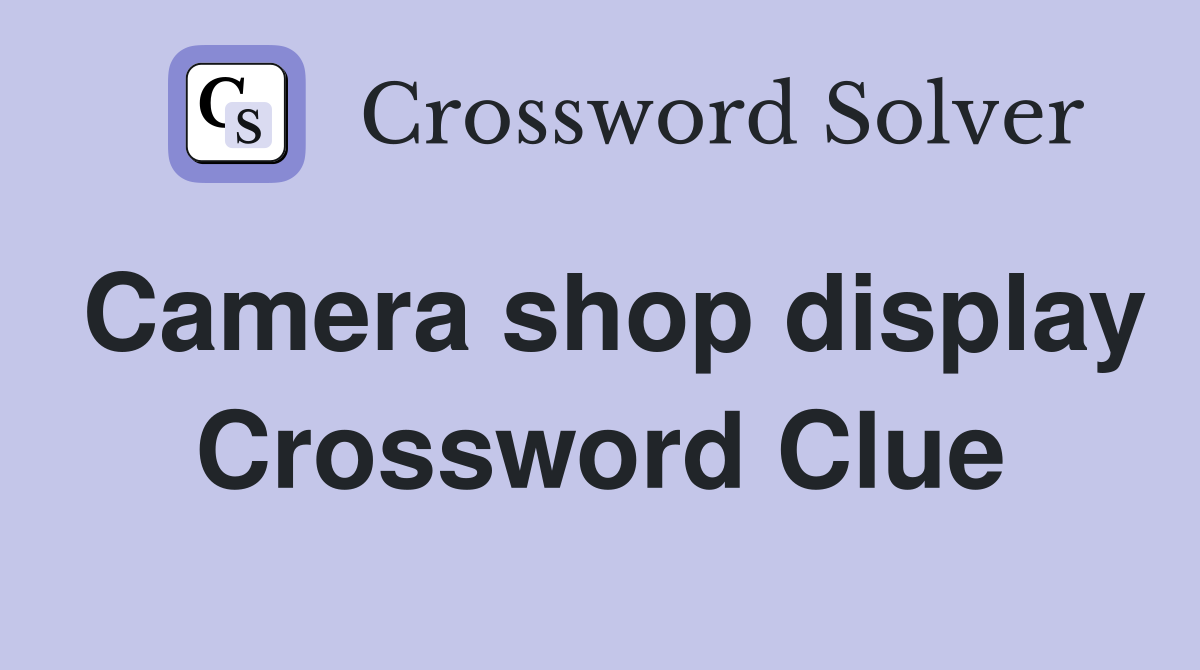 Camera shop display Crossword Clue
