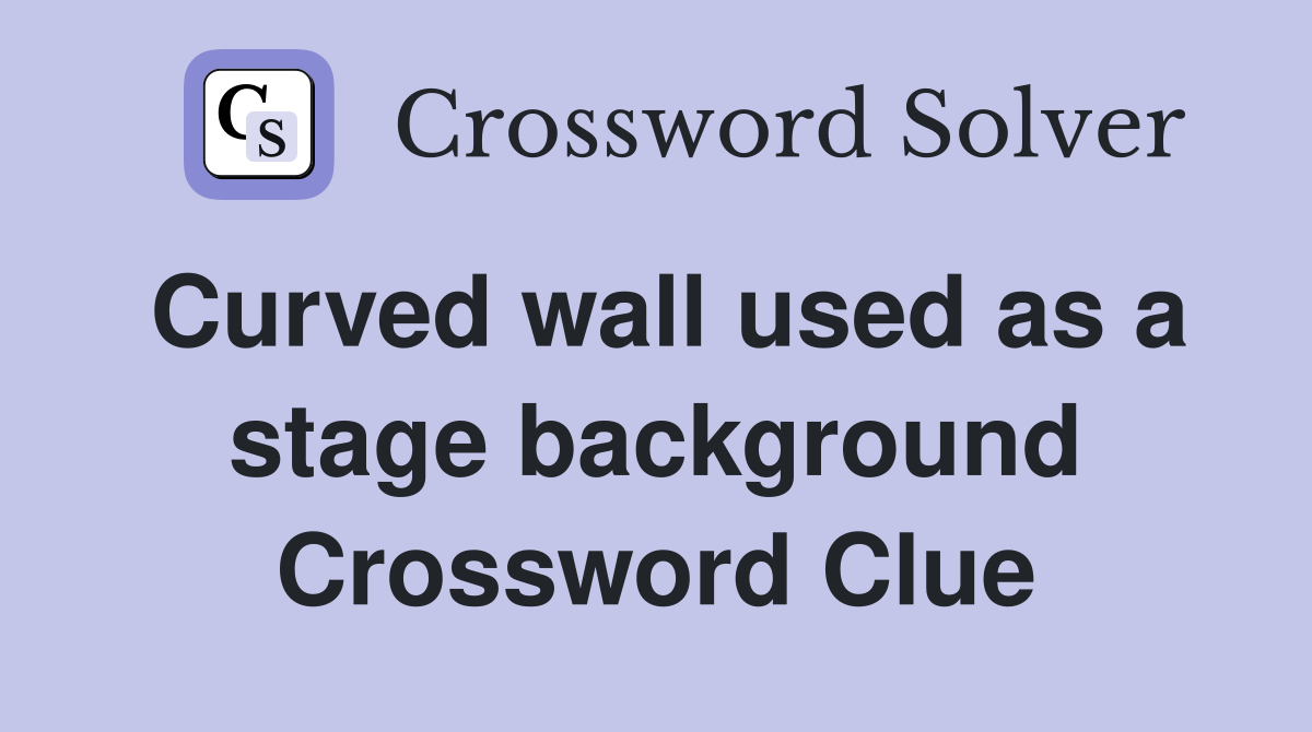 Curved wall used as a stage background Crossword Clue