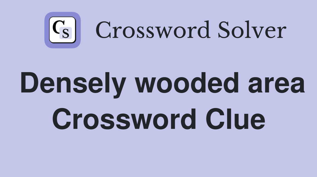 Densely wooded area Crossword Clue