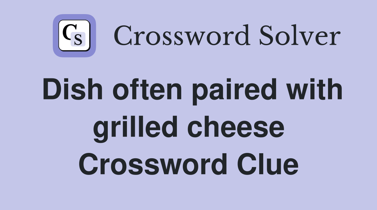 Dish often paired with grilled cheese Crossword Clue