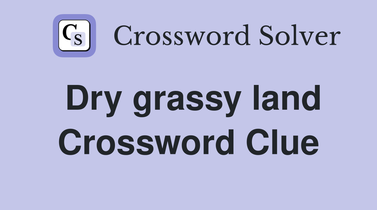 Dry grassy land Crossword Clue