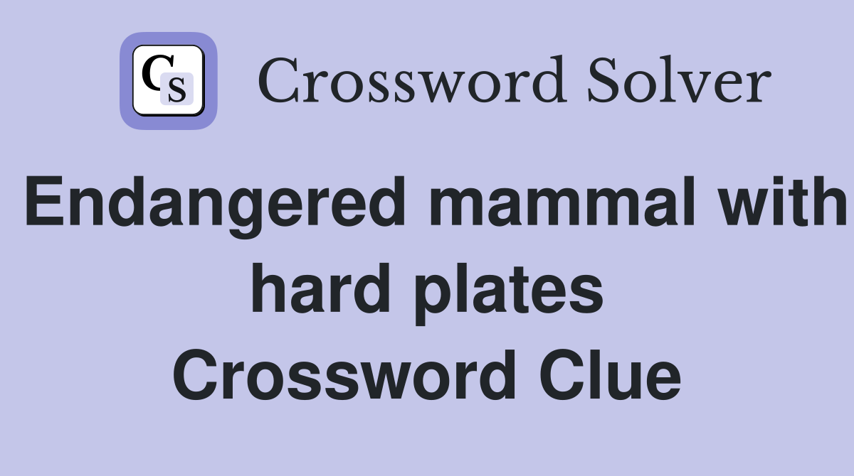 Endangered mammal with hard plates Crossword Clue