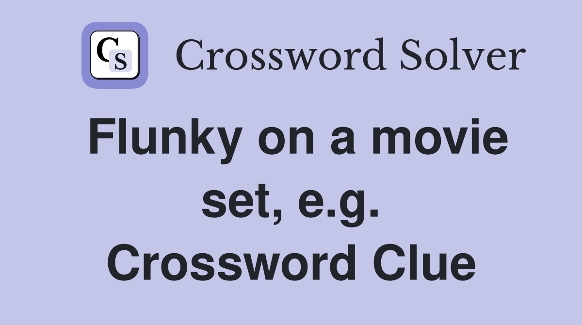 Flunky on a movie set, e.g. Crossword Clue