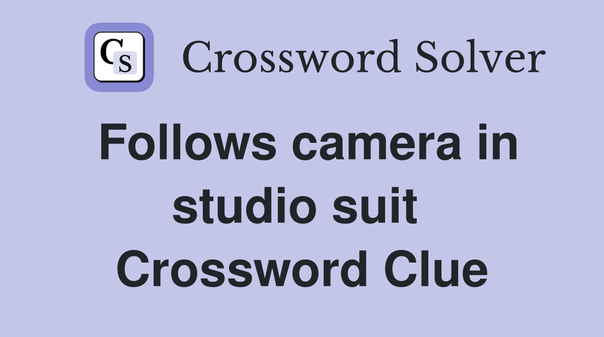 Follows camera in studio suit  Crossword Clue