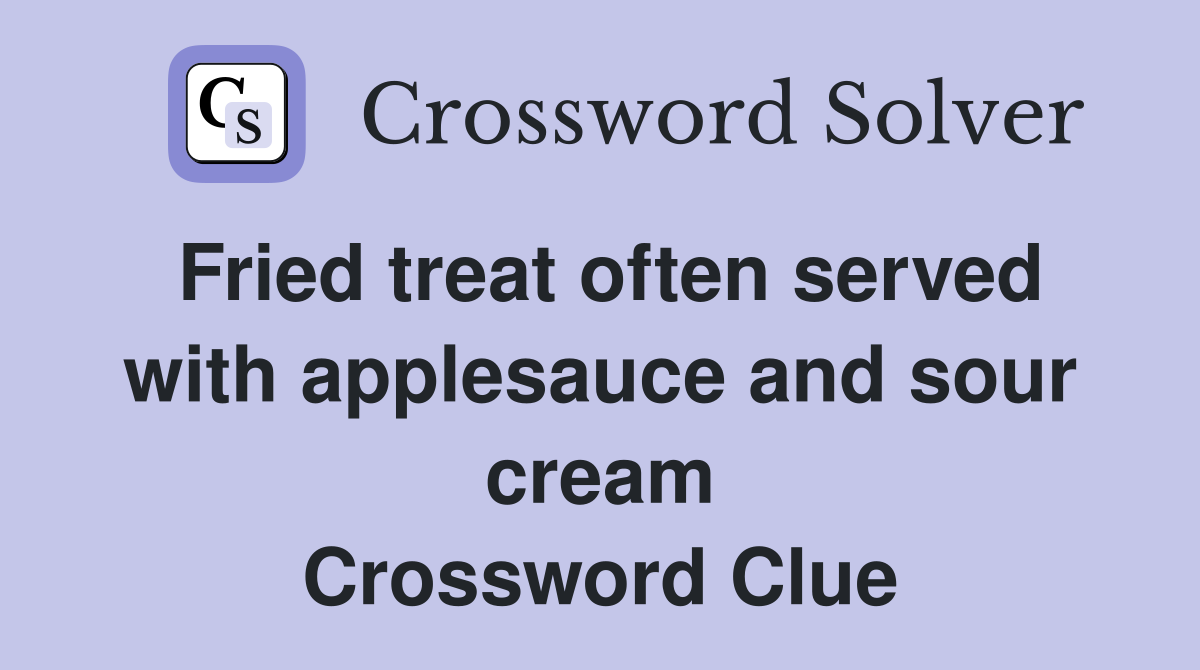 Fried treat often served with applesauce and sour cream Crossword Clue