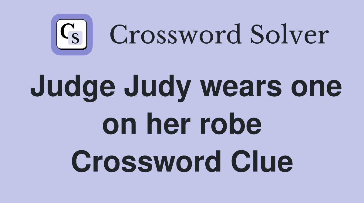 Judge Judy wears one on her robe Crossword Clue