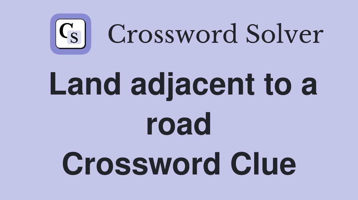 Land adjacent to a road Crossword Clue