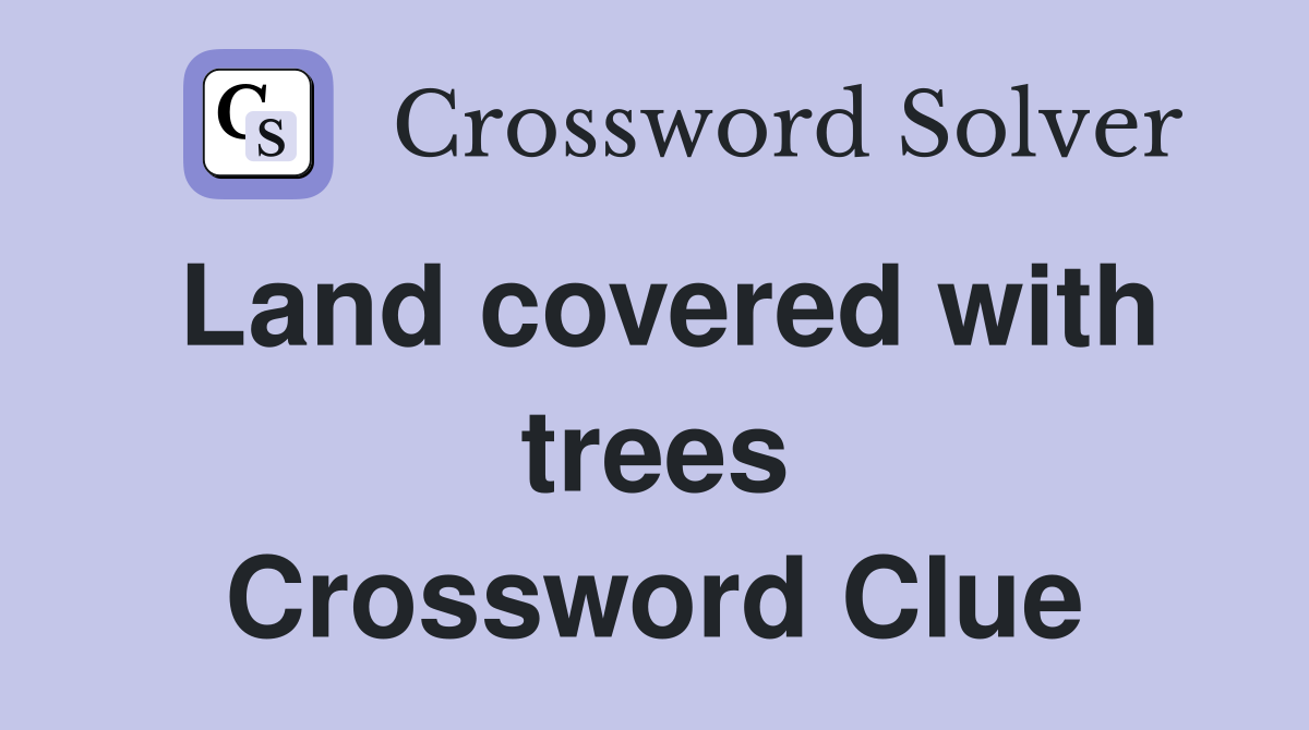 Land covered with trees Crossword Clue