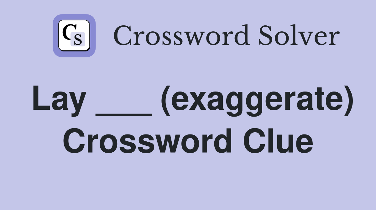Lay ___ (exaggerate) Crossword Clue