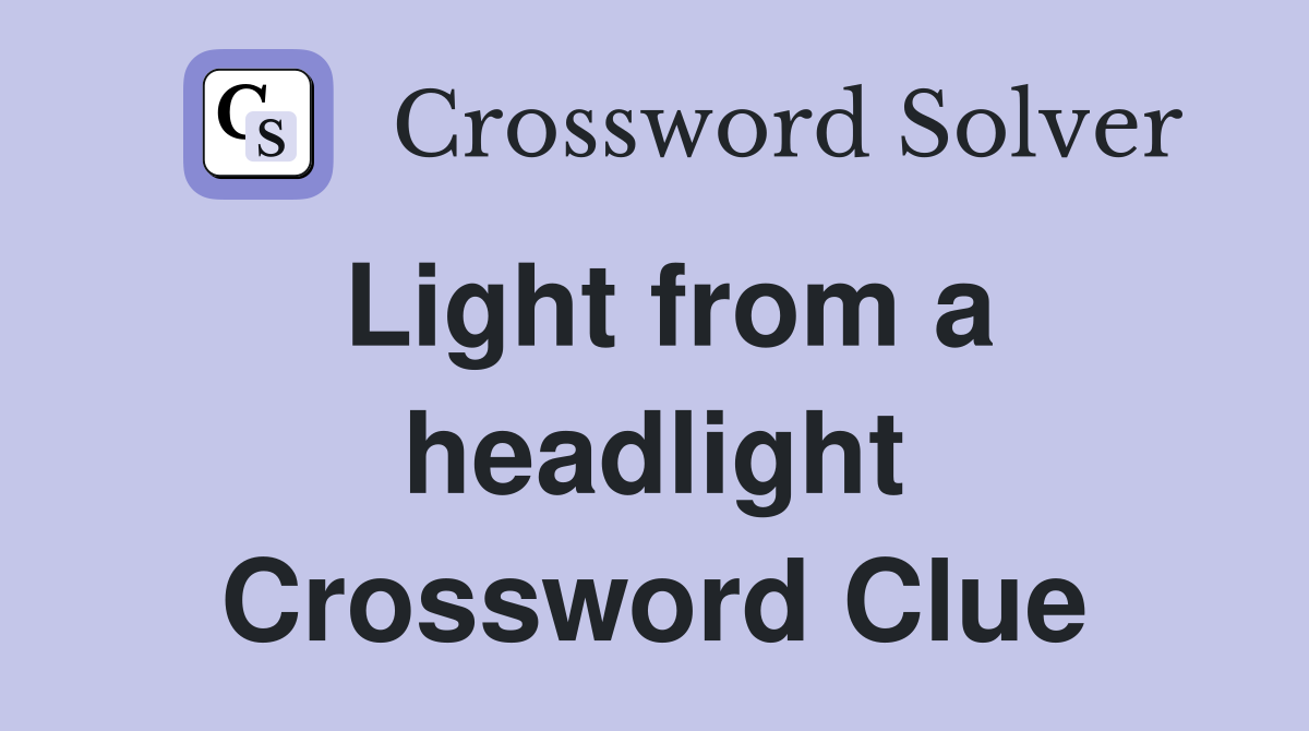 Light from a headlight Crossword Clue