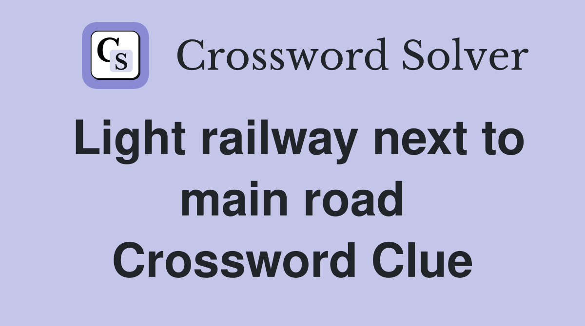 Light railway next to main road Crossword Clue