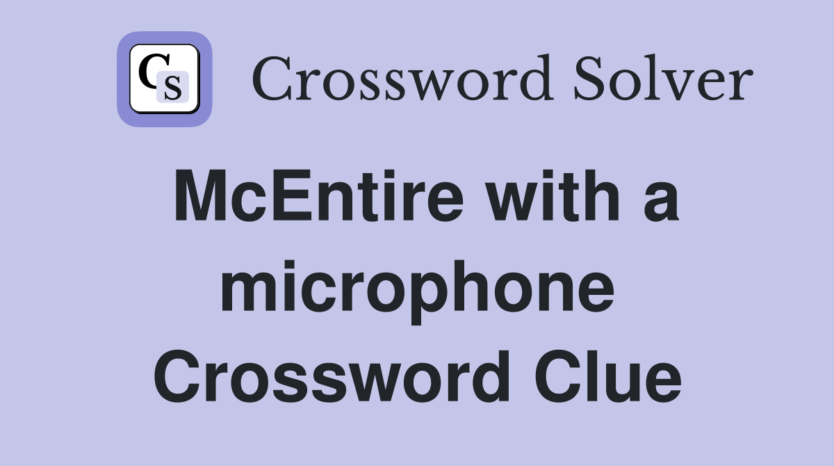 McEntire with a microphone Crossword Clue