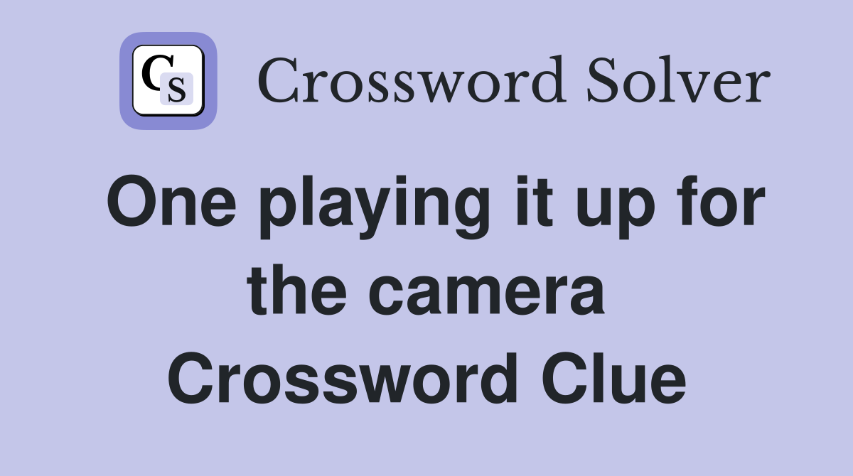 One playing it up for the camera Crossword Clue