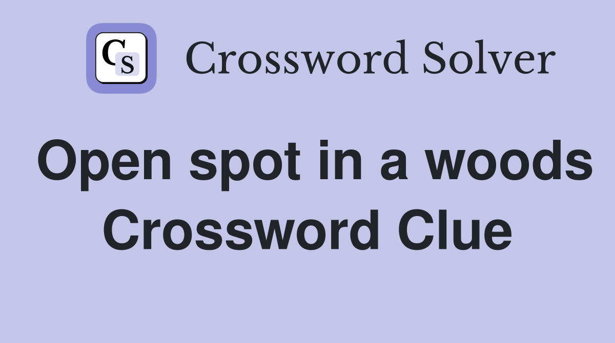Open spot in a woods Crossword Clue