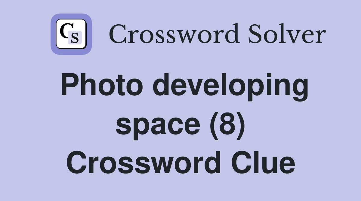 Photo developing space (8) Crossword Clue