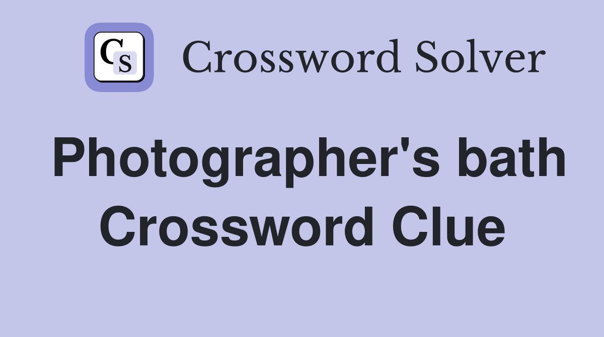 Photographer's bath Crossword Clue