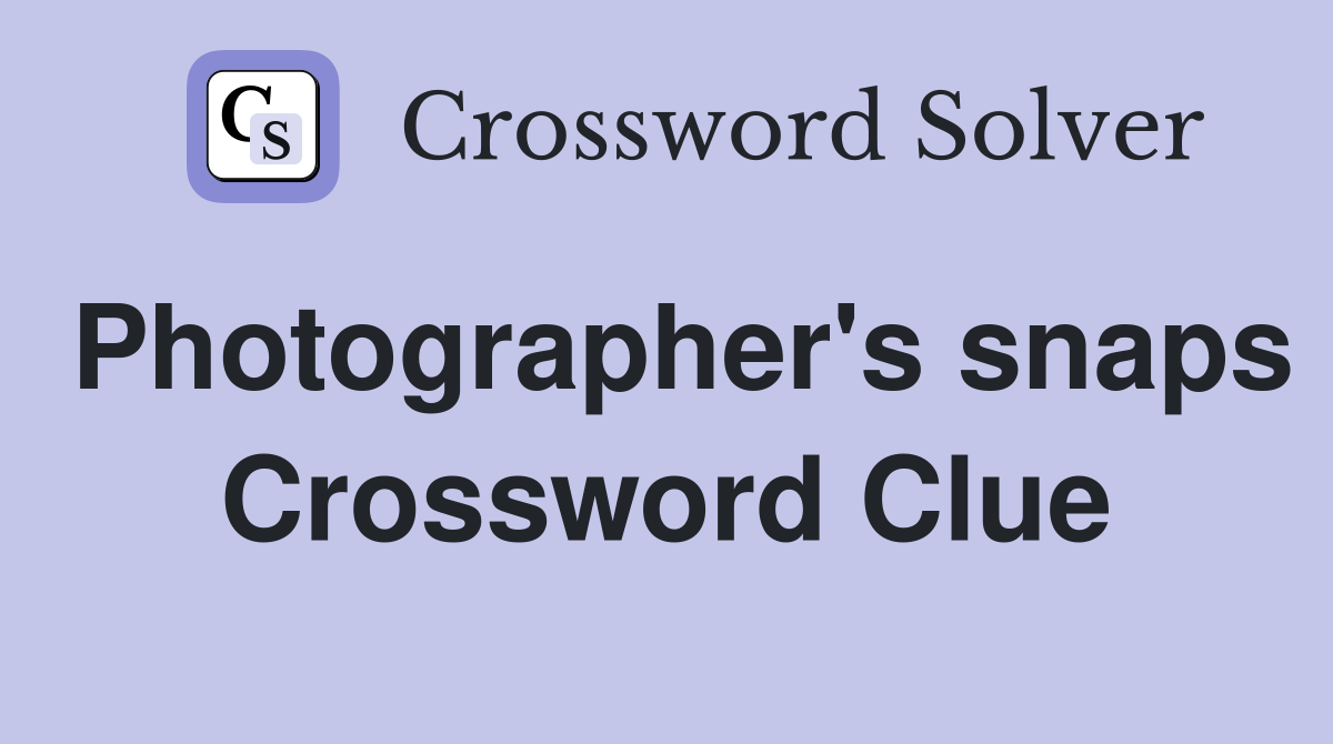 Photographer's snaps Crossword Clue