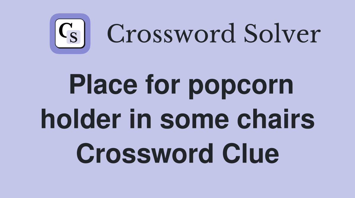 Place for popcorn holder in some chairs Crossword Clue