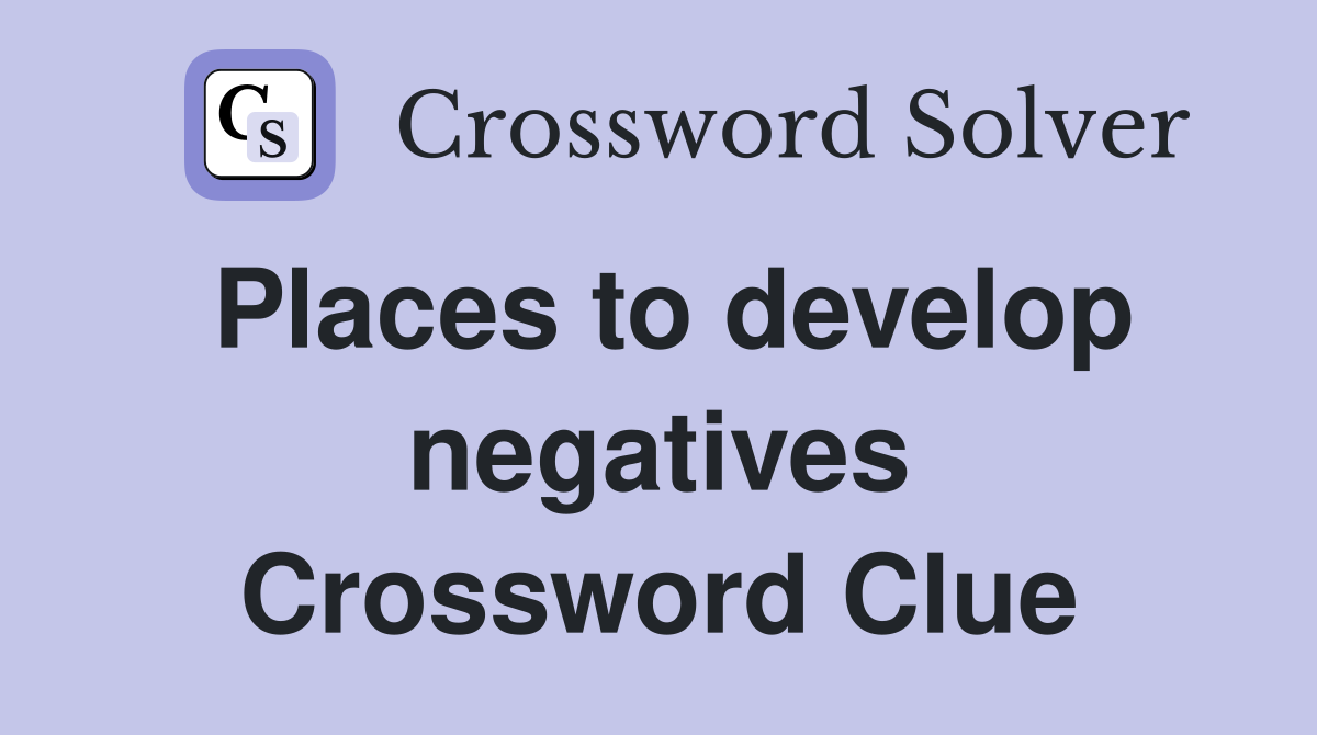Places to develop negatives Crossword Clue