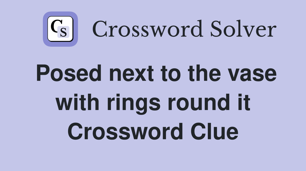 Posed next to the vase with rings round it Crossword Clue