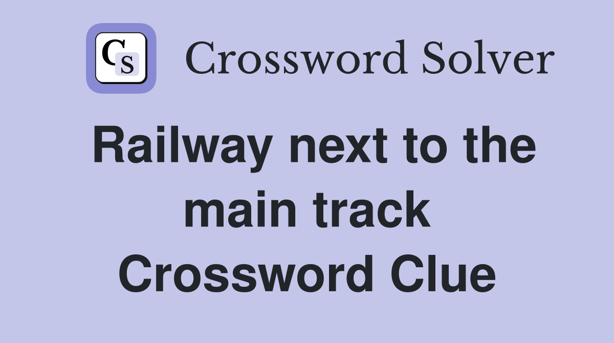 Railway next to the main track Crossword Clue