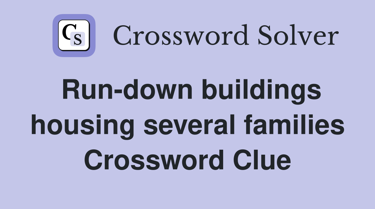 Run-down buildings housing several families Crossword Clue