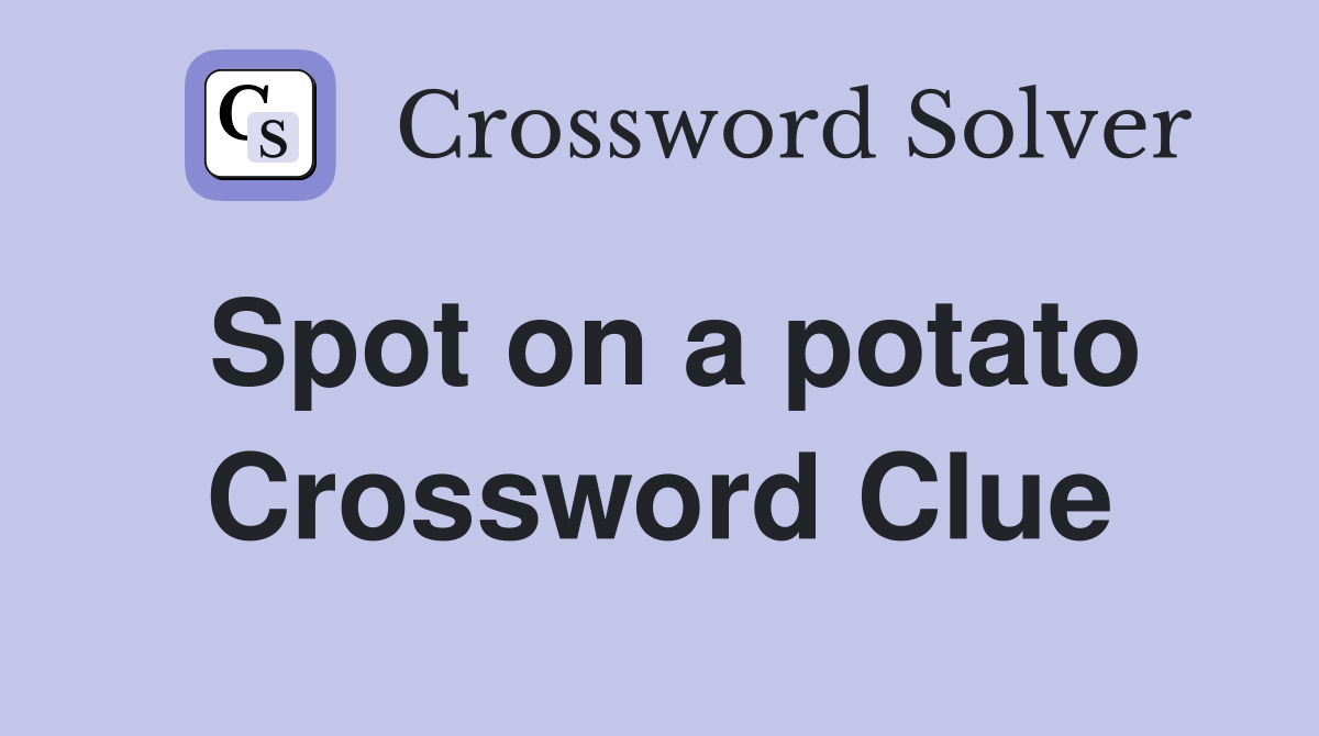 Spot on a potato Crossword Clue