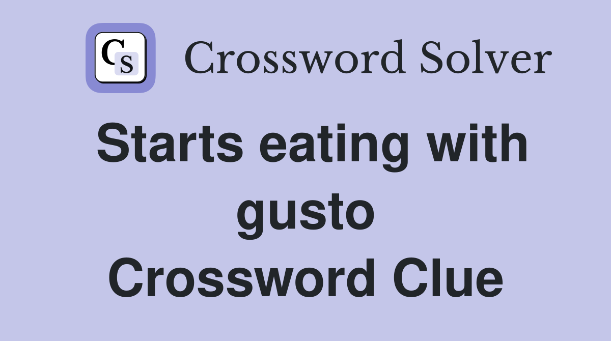 Starts eating with gusto Crossword Clue