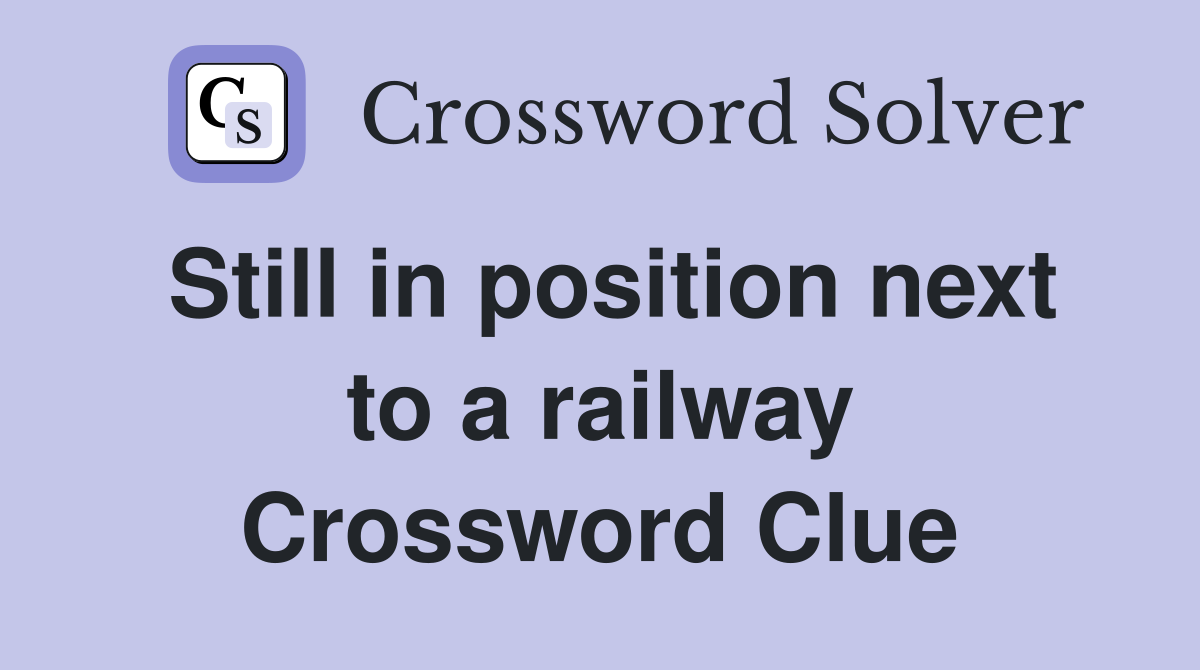 Still in position next to a railway Crossword Clue
