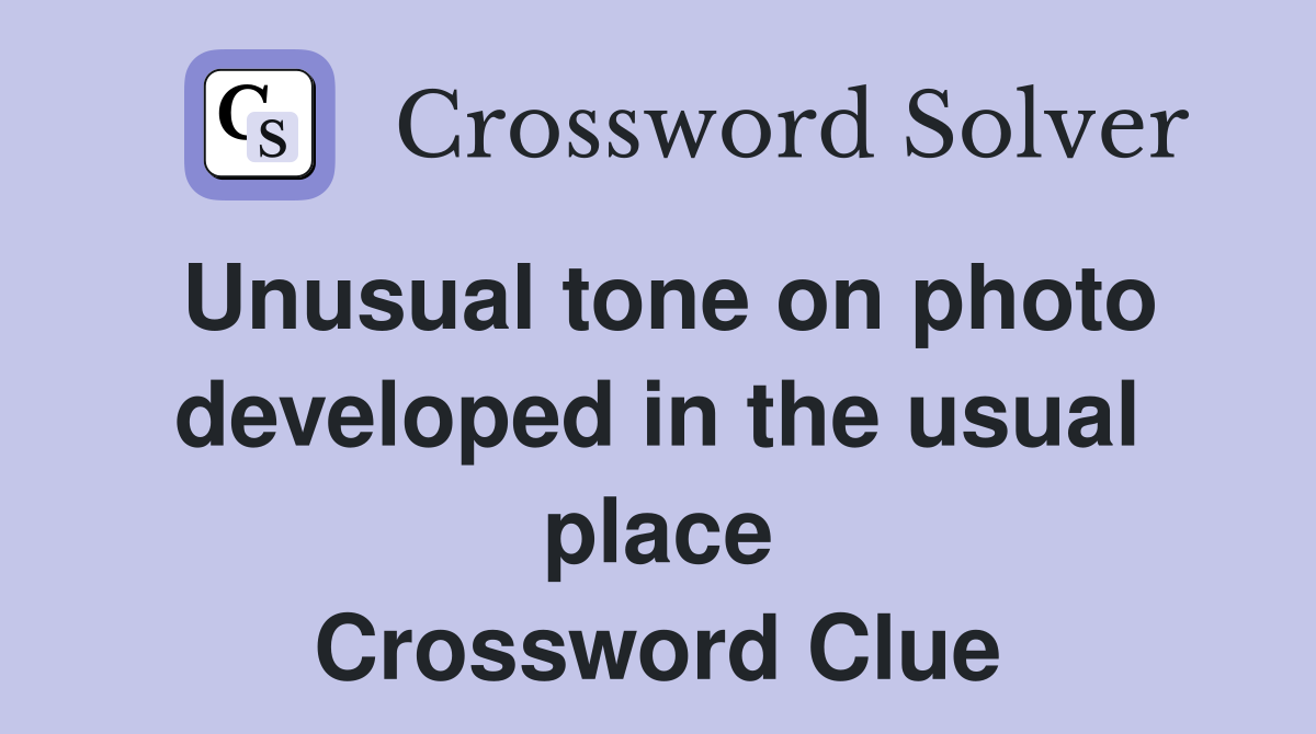 Unusual tone on photo developed in the usual place Crossword Clue