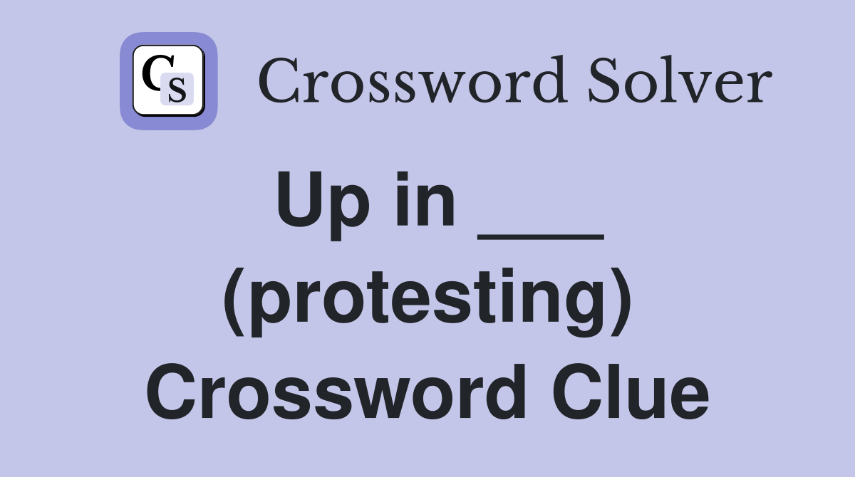 Up in ___ (protesting) Crossword Clue
